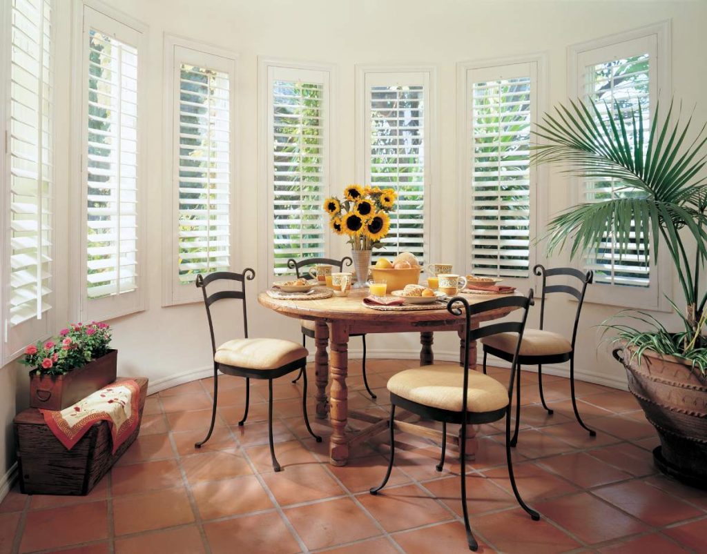 A gorgeous eclectic kitchen nook with Hunter Douglas shutters near Key West, Florida (FL)